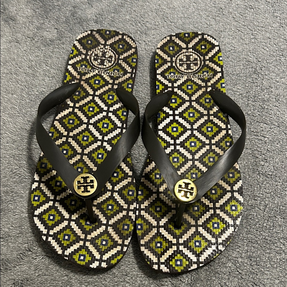 Tory Burch Black Strap Flip Flops with Olive Geometric Print